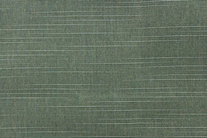 A moss green fabric great for umbrellas, outdoor upholstery and more.