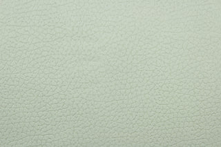 Elmer is a textured fabric featuring a reptile skin design.  It can be used for several different statement projects including window accents (drapery, curtains and swags), toss pillows, bed skirts, light duty upholstery, handbags and duvet covers. It has a soft workable feel yet is stable and durable.  