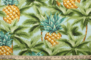 This multi use fabric features large palm trees and pineapples in shades of green, blue, yellow, brown and white.  It is perfect for outdoor settings or indoors in a sunny room.  It is stain and water resistant and can withstand up to 500 hours of direct sun exposure and has a durability rating of 10,000 double rubs.  Uses include decorative pillows, cushions, chair pads, tote bags and upholstery.