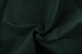  A solid deep green fabric great for umbrellas, outdoor upholstery and more. 