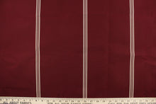 Load image into Gallery viewer,  This fabric features a stripe design in burgundy and light beige. 

