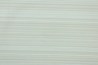 This 2-pass blackout lining in taupe and white stripes is used to keep rooms cooler in the summer and warmer in the winter.  The fabric lining adds fullness to your window treatments.  It is light weight and easy to sew and simple to maintain.