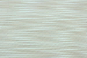 This 2-pass blackout lining in taupe and white stripes is used to keep rooms cooler in the summer and warmer in the winter.  The fabric lining adds fullness to your window treatments.  It is light weight and easy to sew and simple to maintain.