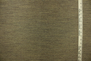 This multi-purpose mock linen in bronze is a woven, textured fabric with a casual feel.  This classic raw silk look is suitable for draperies, curtains, light upholstery, cornice boards and headboards.  We offer Joseph in other colors.