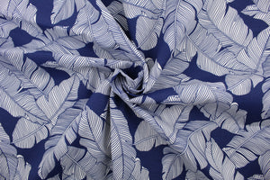 This multi use fabric features a large tropical leaf design in navy blue and white.  It is perfect for outdoor settings or indoors in a sunny room.  It is stain and water resistant and can withstand up to 500 hours of direct sun exposure and has a durability rating of 10,000 double rubs.  Uses include decorative pillows, cushions, chair pads, tote bags and upholstery.