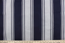 Load image into Gallery viewer, This fabric features a stripe design in navy blue and dull white.
