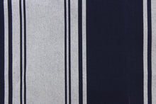 Load image into Gallery viewer, This fabric features a stripe design in navy blue and dull white.
