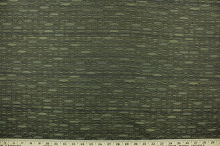 Cumphill is a contemporary/modern fabric in the colors of dark green, dark brown an light gold.  It offers beautiful design, style and color to any space in your home.  It has a soft workable feel and is perfect for window treatments (draperies, valances, curtains, and swags), bed skirts, duvet covers, pillow shams and accent pillows.  