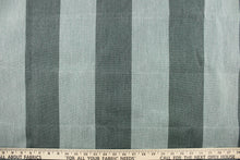 Load image into Gallery viewer,  This fabric features a wide stripe design in a dark and light washout green.
