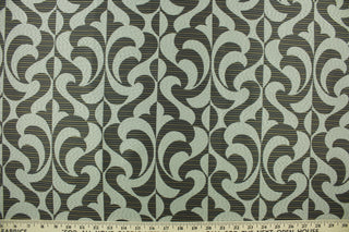 DESCRIPTION:  Ironia features a retro/geometric pattern against a striped background in ebony, blue and brown. This fabric offers beautiful design, style and color to any space in your home.  It has a soft workable feel and is perfect for window treatments (draperies, valances, curtains, and swags), bed skirts, duvet covers, pillow shams and accent pillows.  