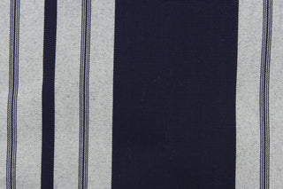 This fabric features a stripe design in navy blue and a dull white.