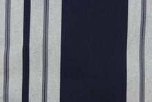 Load image into Gallery viewer, This fabric features a stripe design in navy blue and a dull white.
