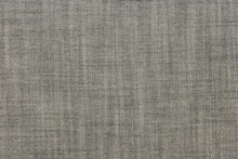 Load image into Gallery viewer, This wide jacquard fabric features a twill look in a gray and black .
