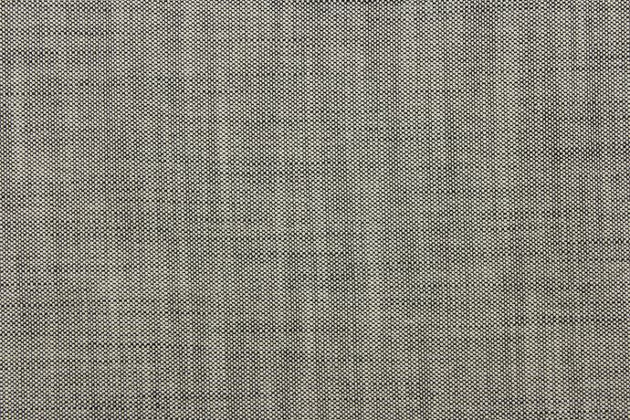 This wide jacquard fabric features a twill look in a gray and black .