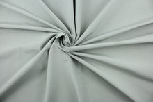 Load image into Gallery viewer, This cotton blend fabric in solid sterling gray offers beautiful design, style and color to any space in your home.  It is perfect for window treatments (draperies, valances, curtains, and swags), bed skirts, duvet covers, light upholstery, pillow shams and accent pillows.  
