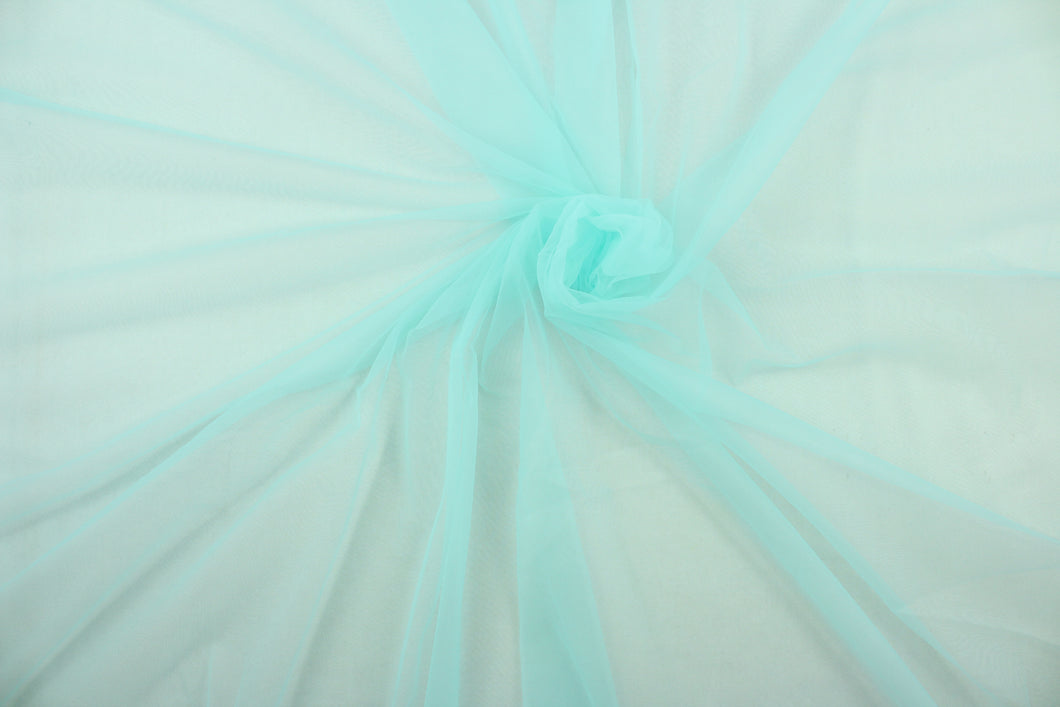  A sheer, light weight, and semi firm tricot in light soft blue. 