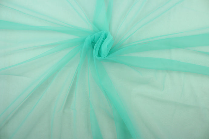 A sheer, light weight, and semi firm tricot in a beautiful seafoam green. 