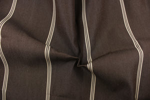 This fabric features a stripe design in rich brown and light beige. 