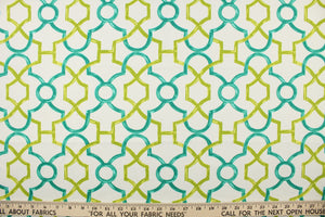 This printed cotton twill fabric features a geometric design in green and teal on a white background.  It is perfect for window treatments, decorative pillows, handbags, light duty upholstery applications.  This fabric has a soft workable feel yet is stable and durable with 50,000 double rubs.  