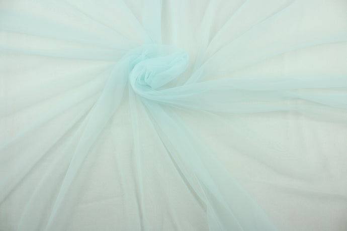  A sheer, light weight, and semi firm tricot in pale blue