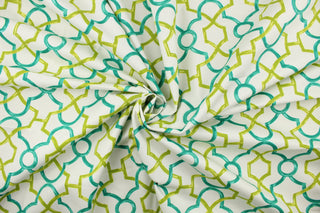 This printed cotton twill fabric features a geometric design in teal and green on a white background.  It is perfect for window treatments, decorative pillows, handbags, light duty upholstery applications.  This fabric has a soft workable feel yet is stable and durable with 50,000 double rubs.  