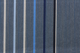 This fabric features a stripe design in varying shades of blue, gray, and black. 