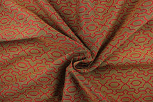 Load image into Gallery viewer, This fabric features a geometric pattern in dark red on a black/gold background.   It is durable and hard wearing and would be great for multi-purpose upholstery, bedding, cornice boards, accent pillows and drapery.  
