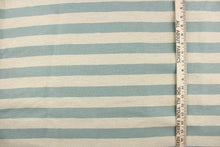 Load image into Gallery viewer, This striped high end upholstery weight fabric is suited for uses that requires a more durable fabric. The reinforced backing makes it great for upholstery projects including sofas, chairs, dining chairs, pillows, handbags and craft projects.  It is soft and pliable and would make a great accent to any room.  Colors included blue green and light beige.
