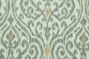 This fabric features a demask design in gray, dull white and nude.