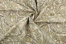 Load image into Gallery viewer, This fabric features a paisley design in moss green, beige and off white .

