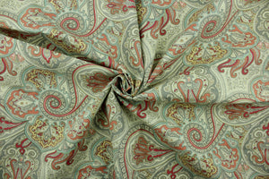  This fabric features a paisley design in light pink, dark pink, gray, pale yellow, light blue, and off white.