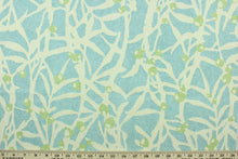 Load image into Gallery viewer,  This fabric features a branch design in light blue and light green against a off white. 
