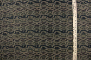 This fabric features a twisted rope design in black, brown and dark olive green.  It offers beautiful design, style and function.  Uses include window treatments (draperies, valances, curtains, swags), duvet covers, light upholstery, accent pillows and home decor.