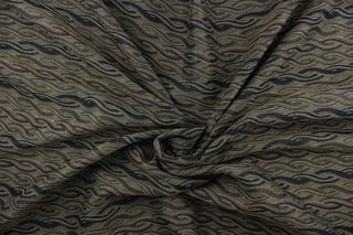 This fabric features a twisted rope design in black, brown and dark olive green.  It offers beautiful design, style and function.  Uses include window treatments (draperies, valances, curtains, swags), duvet covers, light upholstery, accent pillows and home decor.