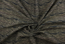 Load image into Gallery viewer, This fabric features a twisted rope design in black, brown and dark olive green.  It offers beautiful design, style and function.  Uses include window treatments (draperies, valances, curtains, swags), duvet covers, light upholstery, accent pillows and home decor.
