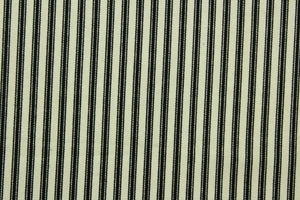  This fabric features a ticking design in black set against a pale beige background. 
