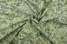 Load image into Gallery viewer, This fabric features a paisley design in gold, and varying shades of gray. 
