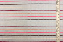 Load image into Gallery viewer, This sheer fabric features a stripe design in a mauve, pink, nude, brown, and burgundy against a silver . 
