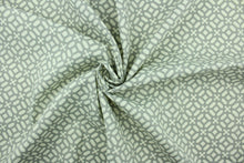 Load image into Gallery viewer,  This fabric features a lattice design in gray and white

