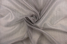 Load image into Gallery viewer, This sheer fabric features a stripe design in brown against gray . 
