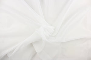 A sheer fabric  in a solid white
