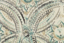 Load image into Gallery viewer, This fabric features a decorative overlapping circle design in shades of gray, turquoise, and beige set against a dull white . 
