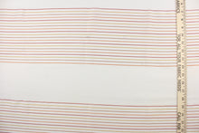 Load image into Gallery viewer, This sheer fabric features a stripe design in orange, brown, red, and golden yellow  against white. 
