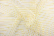 Load image into Gallery viewer, This sheer fabric features a stripe design in gold and cream . 
