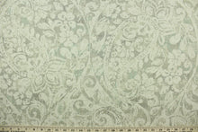 Load image into Gallery viewer, This fabric features a floral paisley design in natural, gray, and light turquoise
