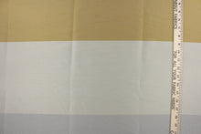 Load image into Gallery viewer, This sheer fabric features a wide stripe design in a gray, gold and silver . 

