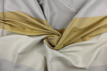 Load image into Gallery viewer, This sheer fabric features a wide stripe design in a gray, gold and silver . 
