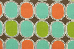 This fabric features a geometric design in bright orange, lime green, and turquoise outlined in white and set against a brown background. 