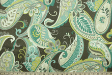 Load image into Gallery viewer, This fabric features a paisley design in brown, gray, white, lime green, turquoise, teal and pale beige. 
