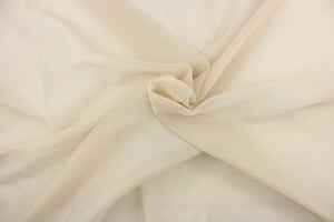 A sheer fabric  in a pale khaki.